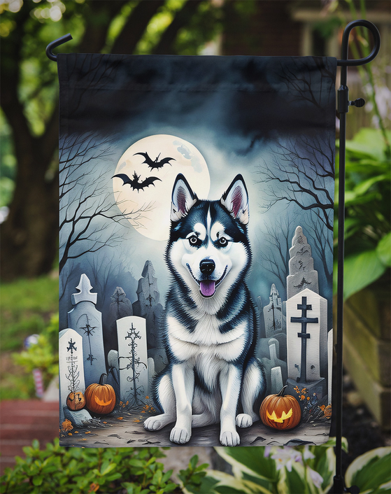 Halloween garden flag with black-and-white husky in graveyard scene and bats