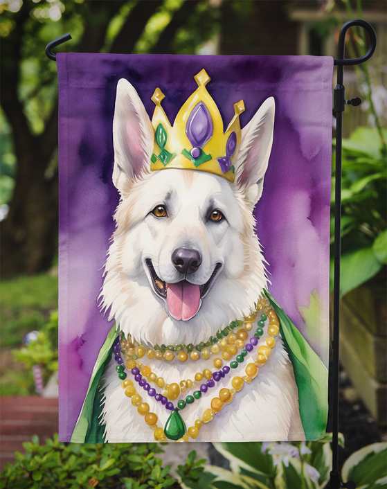 Outdoor garden flag on stake featuring white German Shepherd with Mardi Gras crown