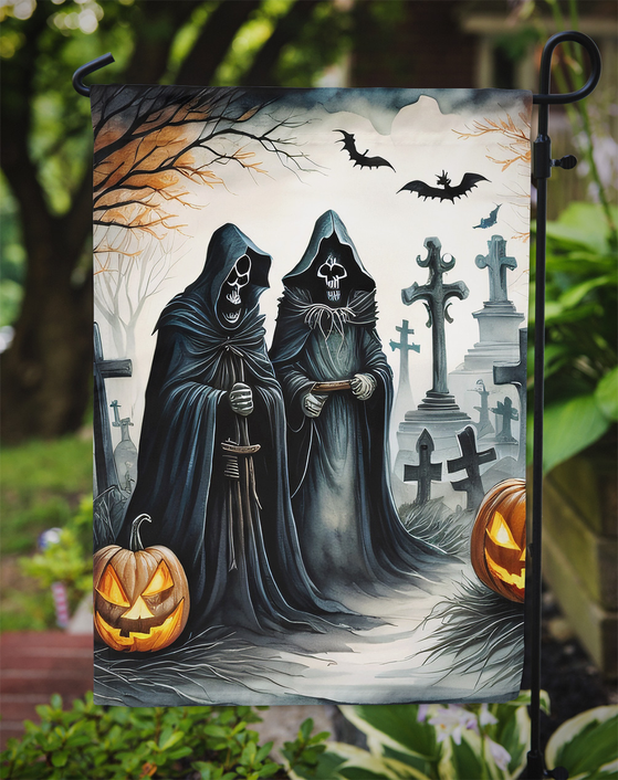 Grim reaper Halloween garden flag close-up with two figures, bats, and gravestones