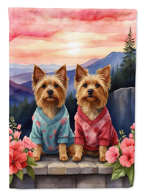 Garden flag with two terriers standing on gray stones with pink flowers