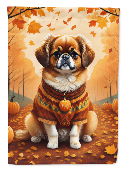 Close-up fall garden flag with Tibetan spaniel wearing orange sweater and leaves