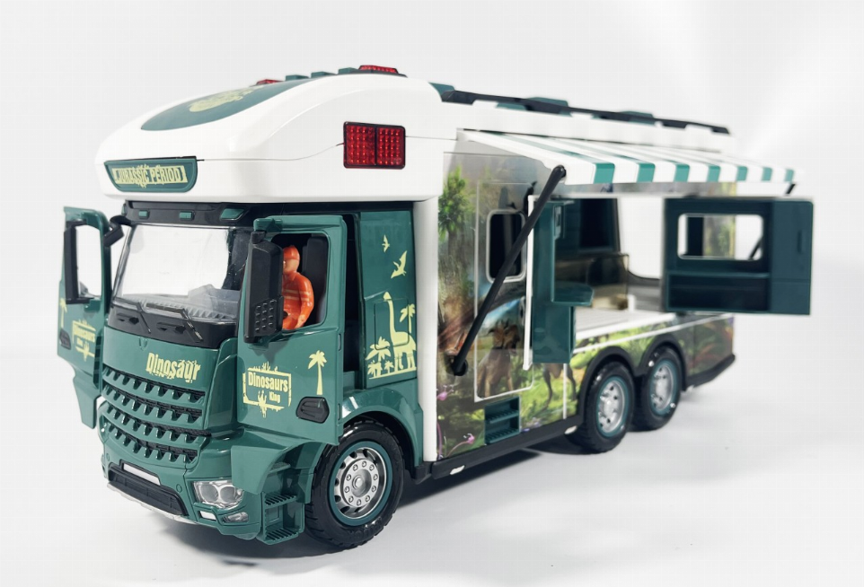 Jurassic toy RV with open side and cab, dinosaur-themed decals and three-axle wheels