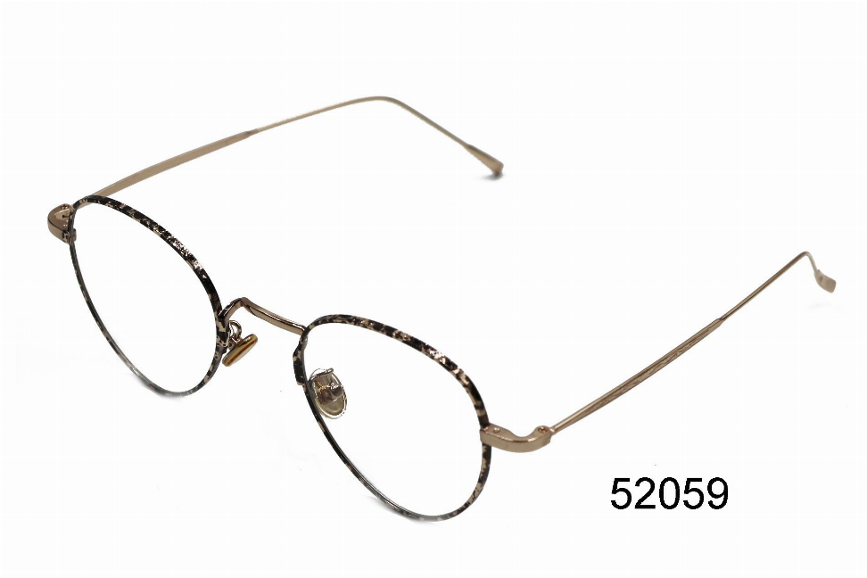 Round metal sunglasses with tan frames and golden temple arms