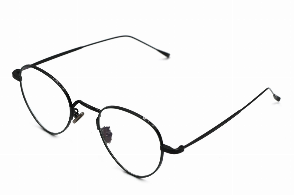 Round metal sunglasses with black frames and rhinestone-detailed rims