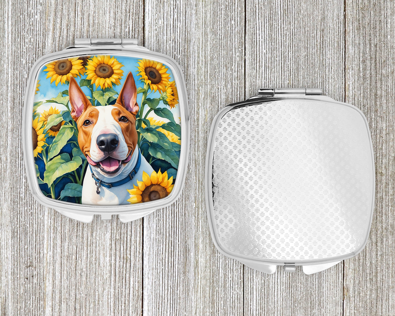 Compact mirror with open silver lid, textured back, and sunflower bull terrier photo