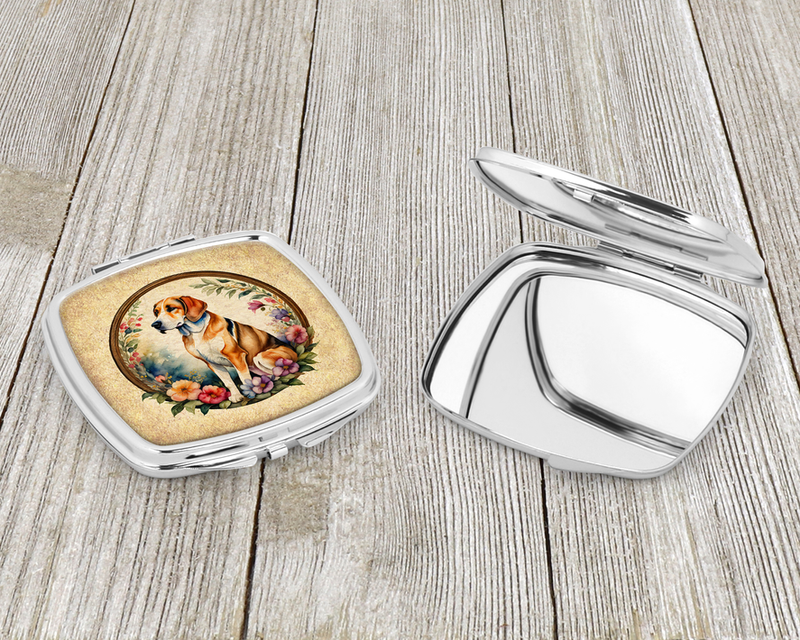 Silver compact mirror open, showing pet portrait inside with a floral border on case