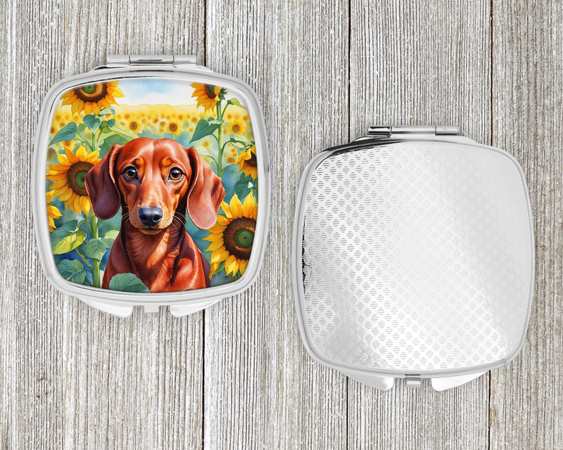 Sunflower compact mirror with red dachshund graphic on one side, closed white case