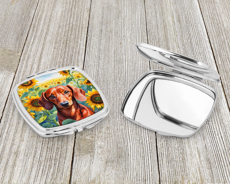 Sunflower compact mirror open-face view with red dachshund graphic in chrome case