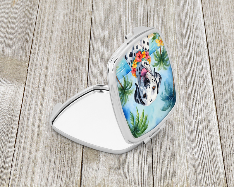 White compact mirror with dalmatian in tropical scene, open hinged cover and round glass
