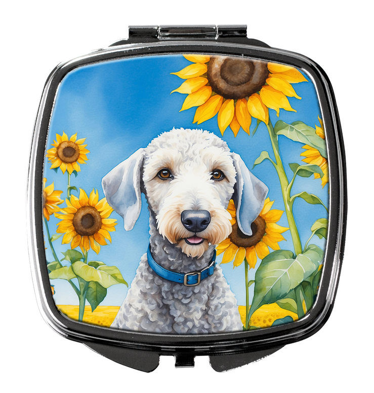 Compact mirror with silver frame and bright sunflower terrier illustration lid.