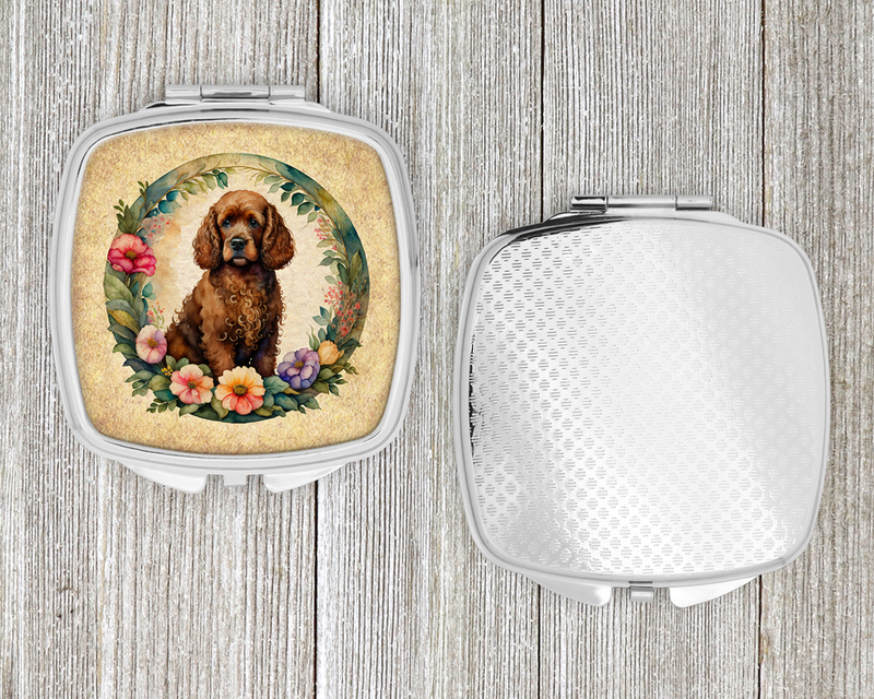 Silver compact mirror case with dog-and-flowers print and textured back