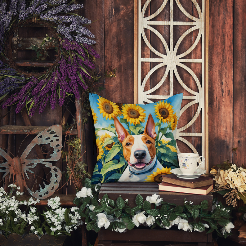 Fox terrier sunflower cushion on rustic bench with mug and floral arrangement