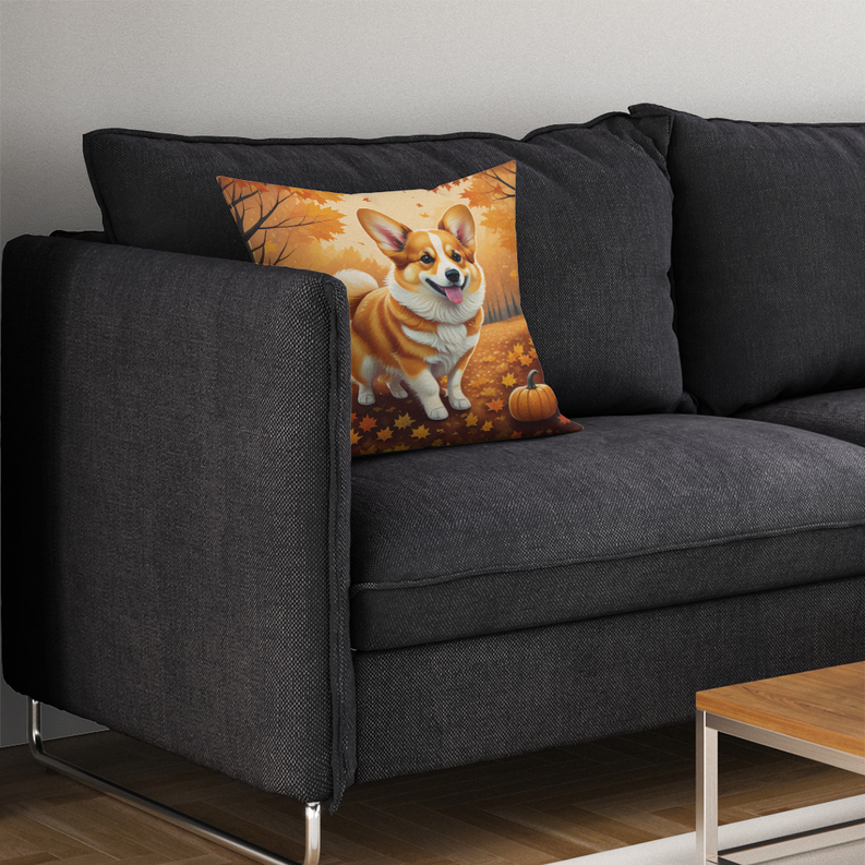 Dog and pumpkin print pot holder on a dark upholstered couch