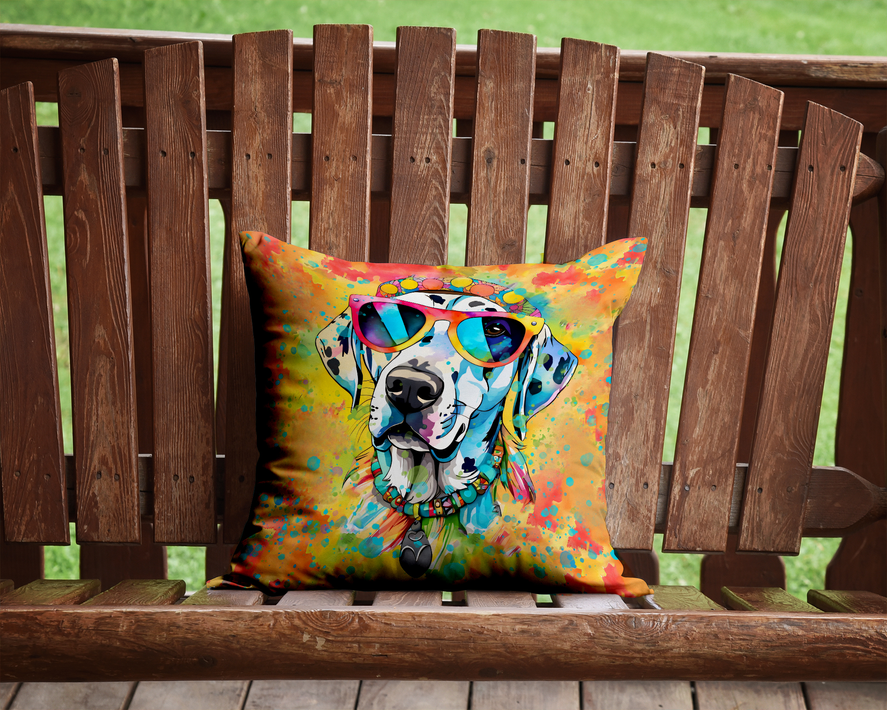 Colorful dog-face throw pillow with blue sunglasses on a wooden outdoor bench