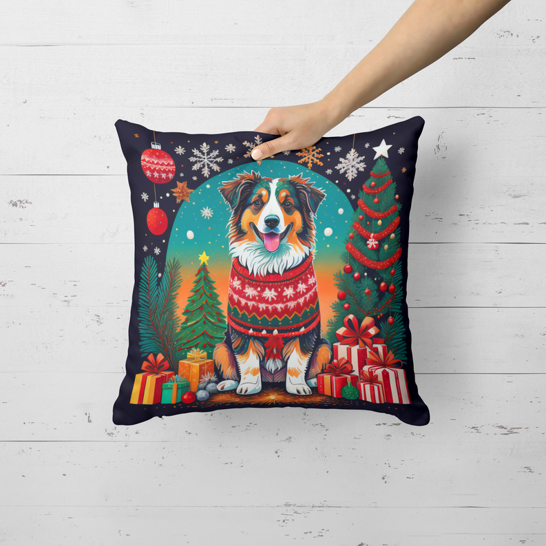 Bearded collie Christmas throw pillow held up, navy background with presents and trees