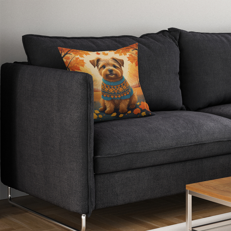 Autumn Rhodesian Ridgeback throw pillow with orange leaf background and teal scarf.