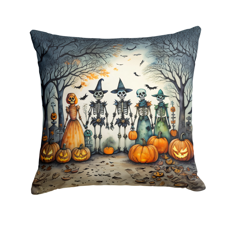 Halloween foam coaster featuring a central skeleton group, pumpkins, bats and graveyard trees.