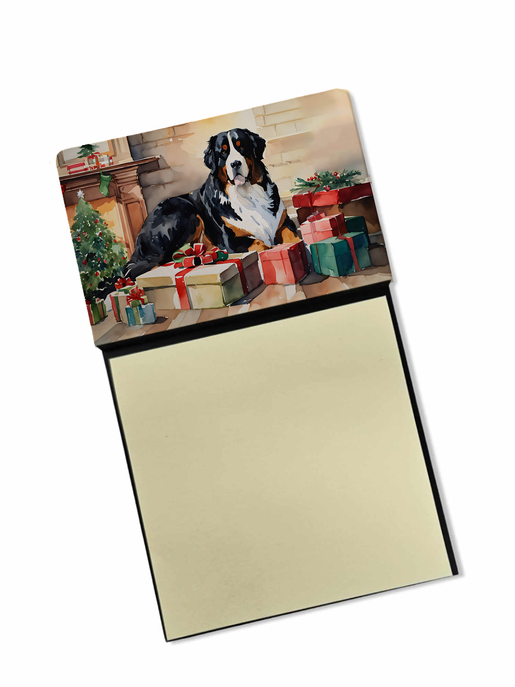 Decorative soy candle with beige sleeve and black-and-white dog among wrapped gifts