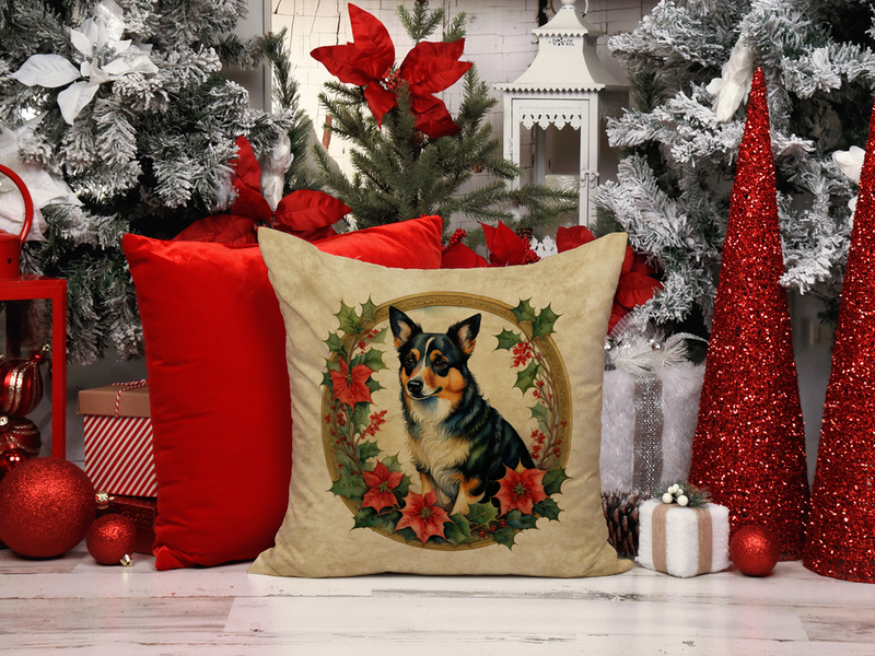 Beige square throw pillow with a dog portrait framed by poinsettia flowers