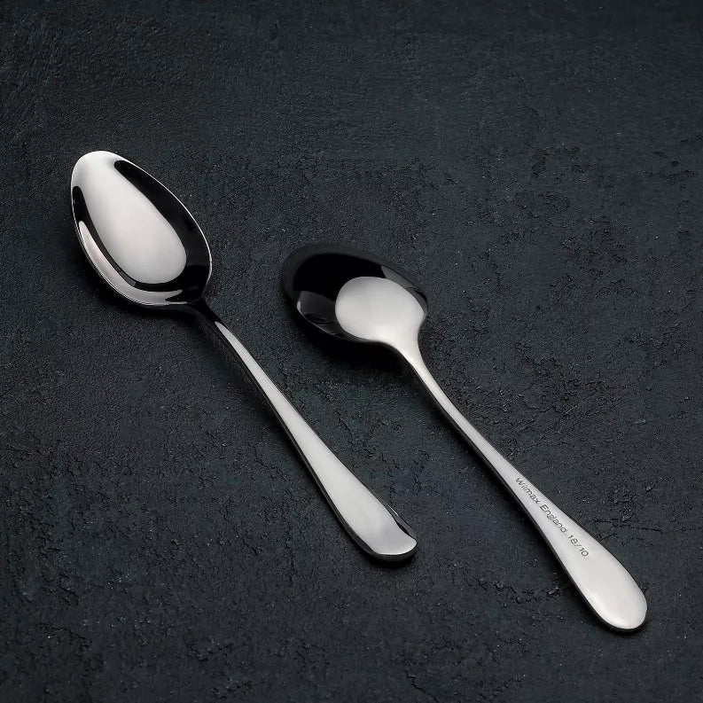 Stainless steel dinner spoon, polished oval bowl with long handle