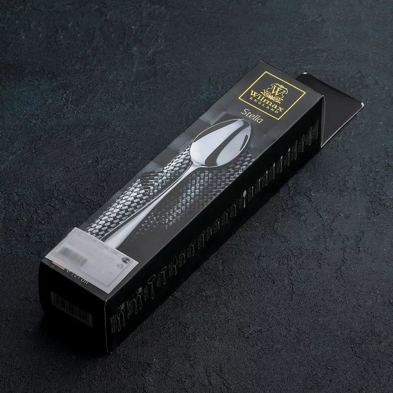 Set of stainless steel dinner spoons in rectangular retail box packaging