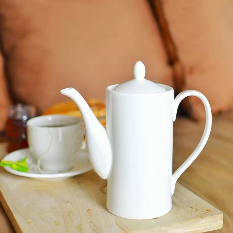 White coffee pot with flip-top lid, curved spout, and side handle