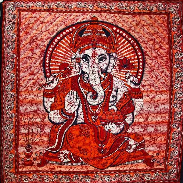 Batik-style tie-dye tapestry featuring seated Ganesha holding lotus, orange robe and ornate red border
