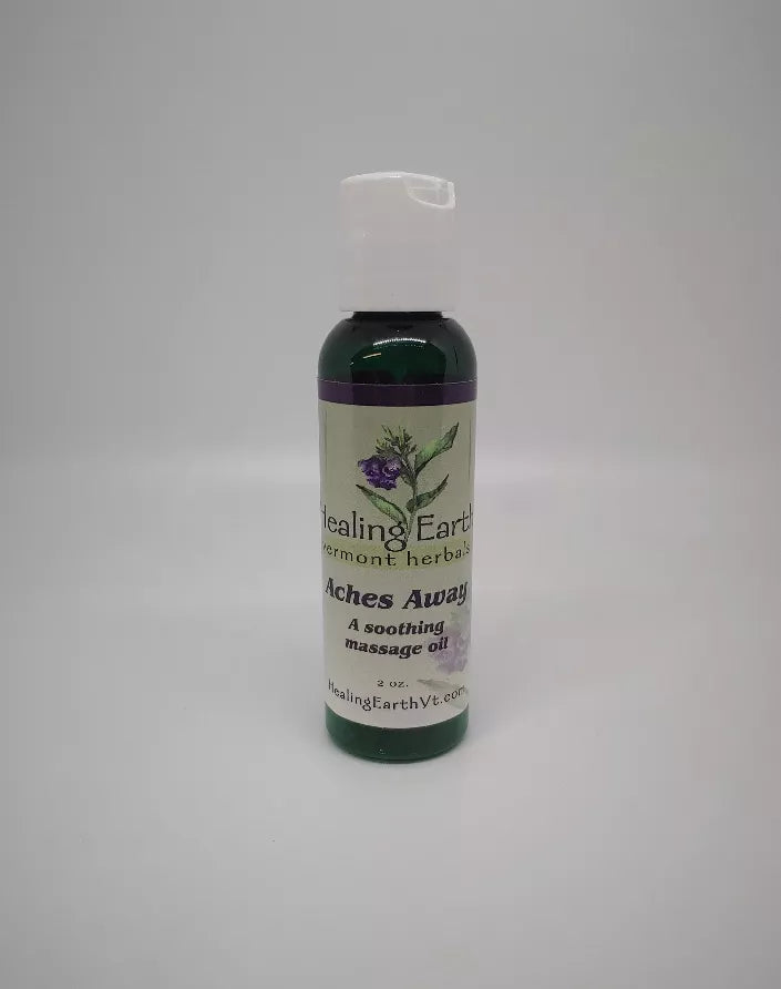 Healing Earth massage oil bottle, dark green bottle with white cap and herb label