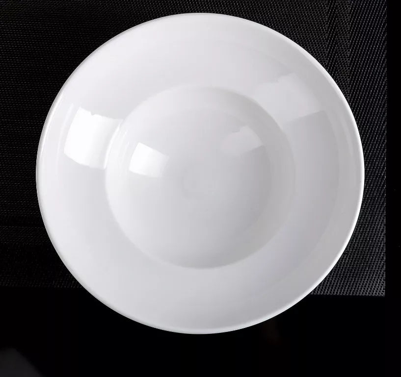 White deep bowl plate front view, round shape and glossy surface