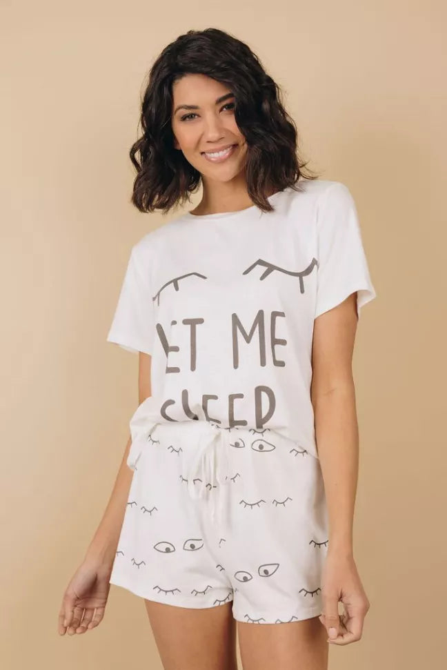 White pajama set with short-sleeve graphic T-shirt and matching printed shorts