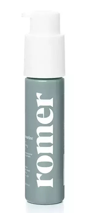 Hydrating lotion pump bottle with pale gray liquid and white pump cap