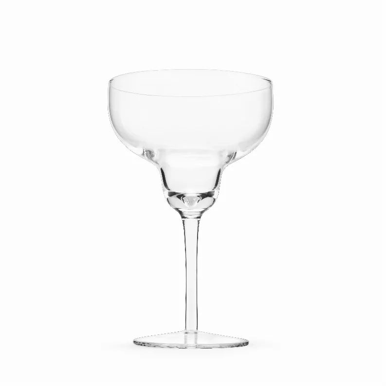 Clear margarita glass with flared bowl and slender stem base