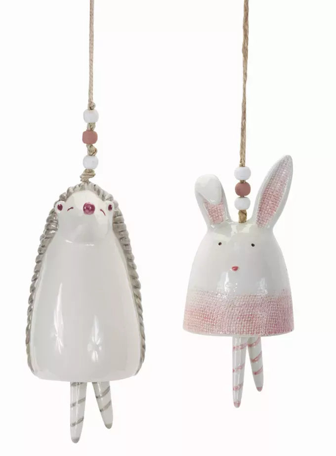 Stoneware hanging bunny bell ornament with pink ears and bead accents