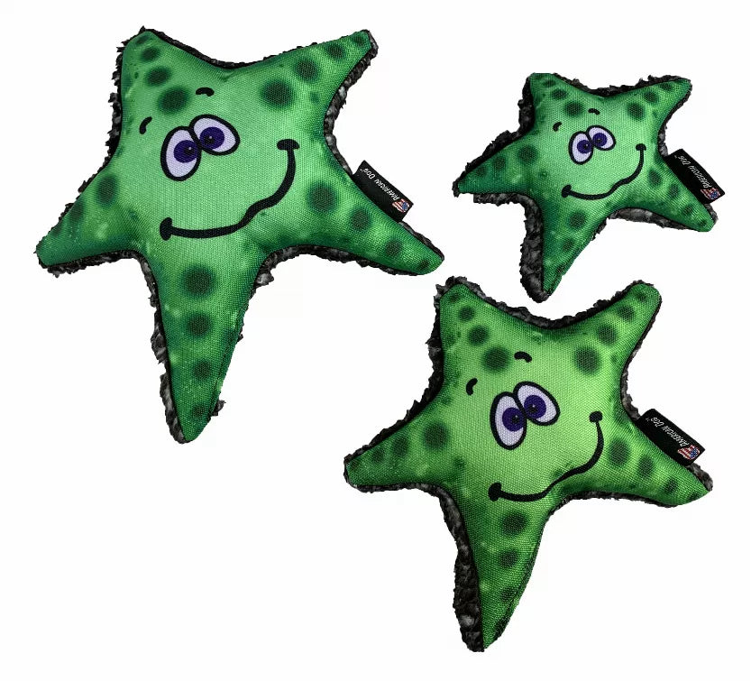 Set of three large neon green starfish dog toys with smiling faces and black trim