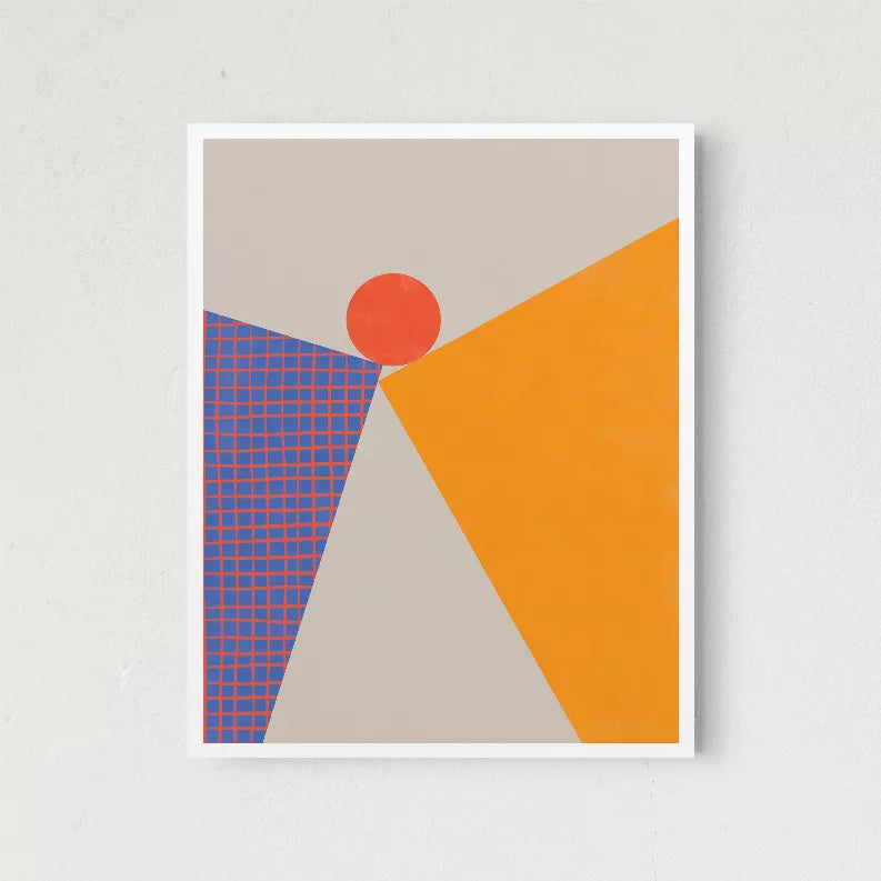 White-framed abstract wall art with red circle over orange and blue shapes