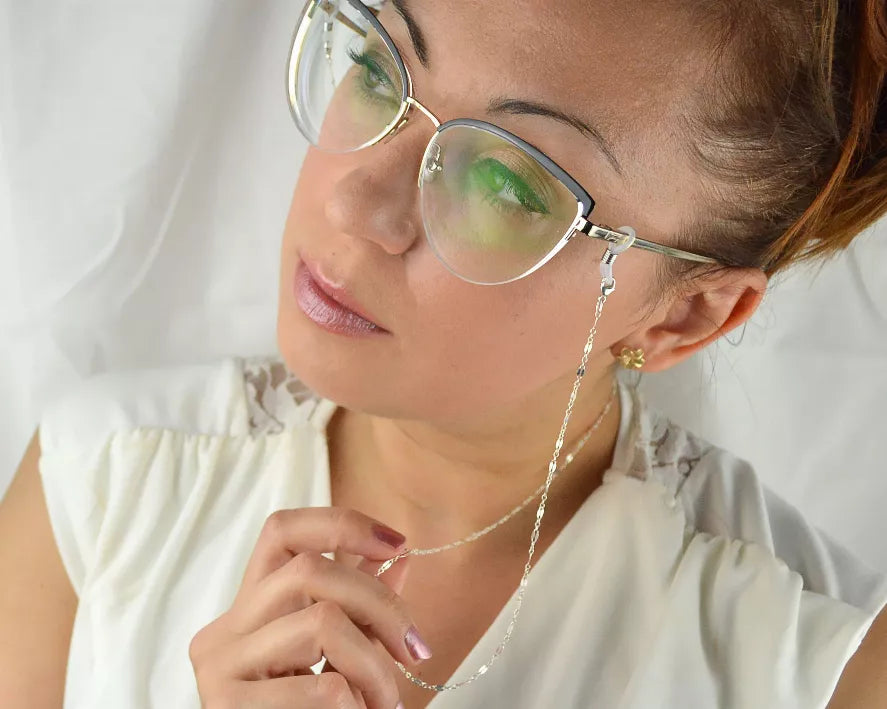 Sunglasses chain draped from eyeglasses, fine link links and small end clasp