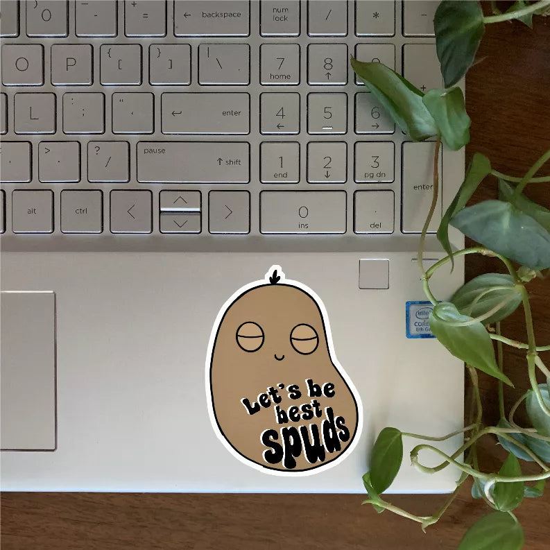 Cartoon potato sticker with 'Let's be best spuds' message, smiling face, white border