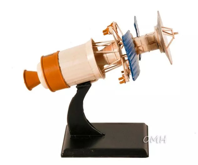 Magellan spacecraft model with orange and cream capsule and blue thruster on dark base
