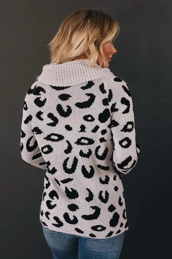 Leopard knit sweater with chunky cowl neck, black leopard print on light base (back)