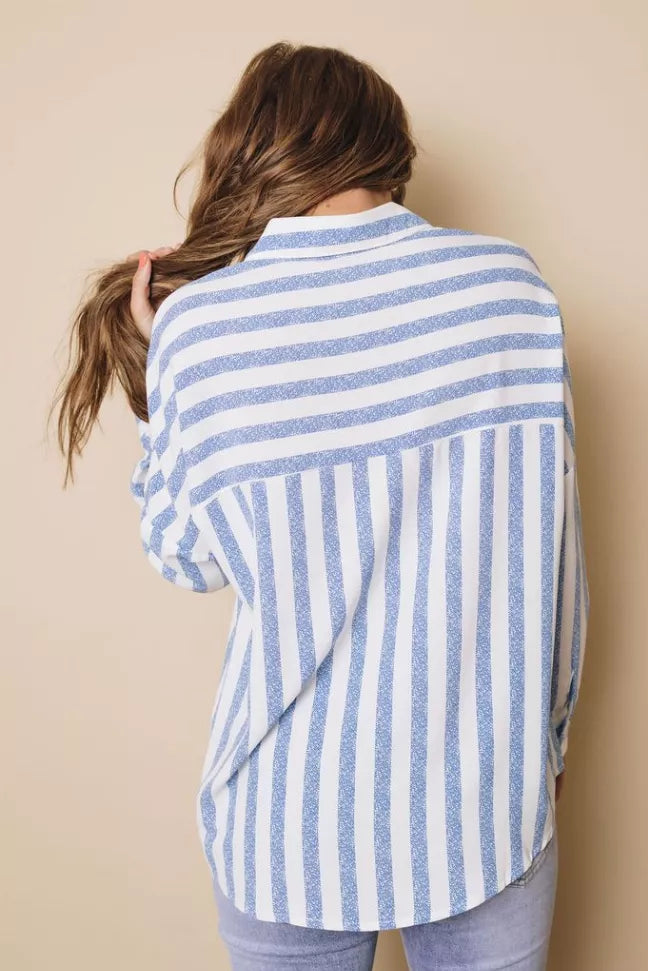 Sky blue striped button-down shirt, back view showing pleated shoulder and long sleeves
