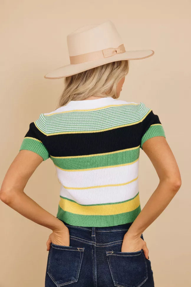 Striped knit crop top back view with green, white, yellow, and black colorblocking