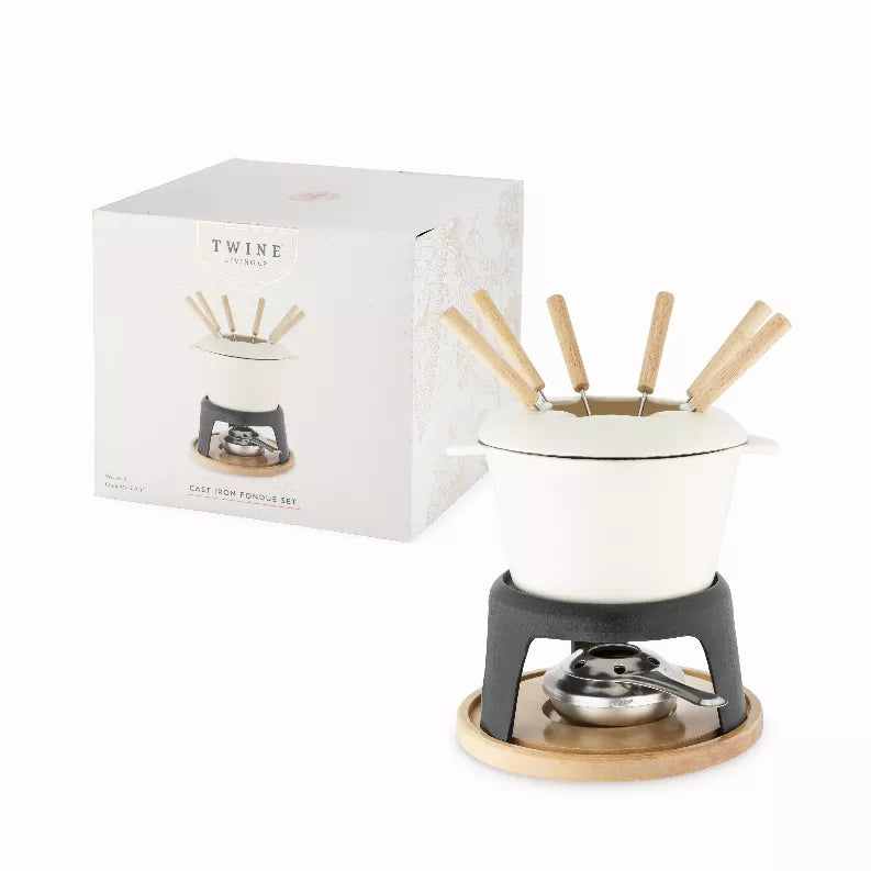 Twine cast iron fondue set with white pot, dark burner, and wooden skewers