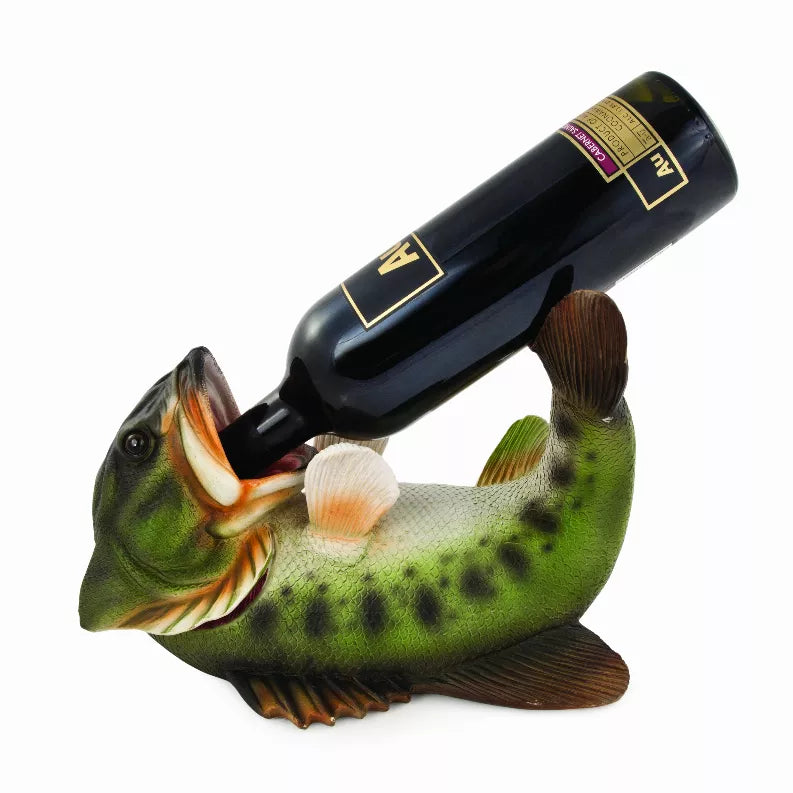 Green fish bottle holder with dark bottle and paintbrush-like top