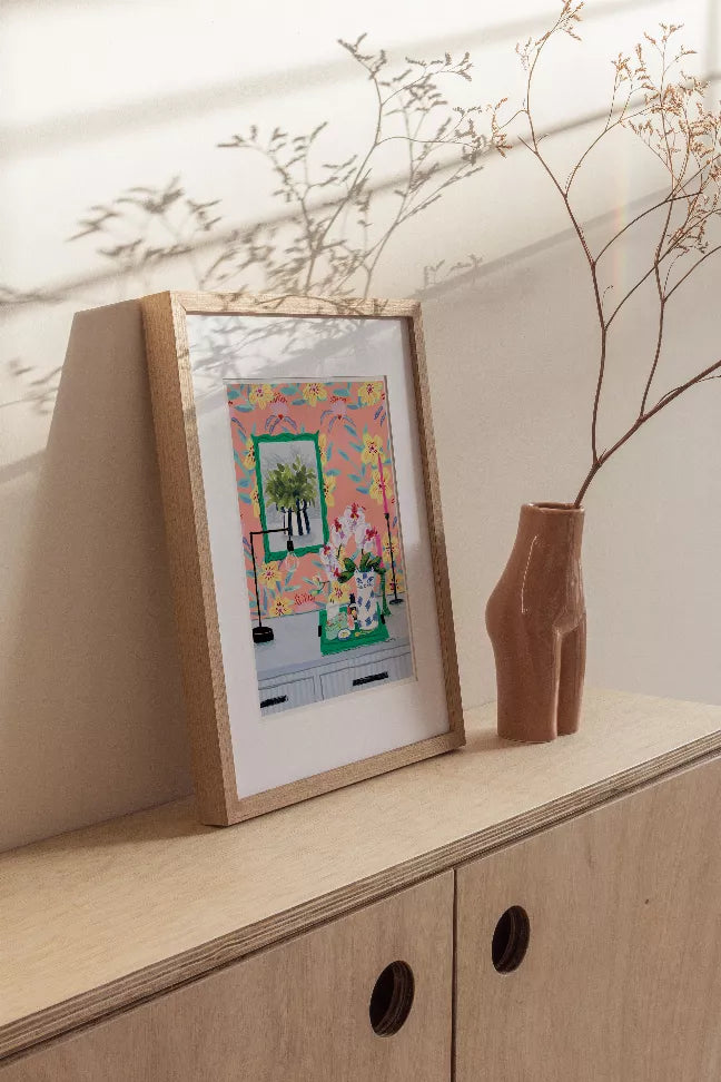 Funky floral wallpaper print panel with pink and teal botanical illustration in frame