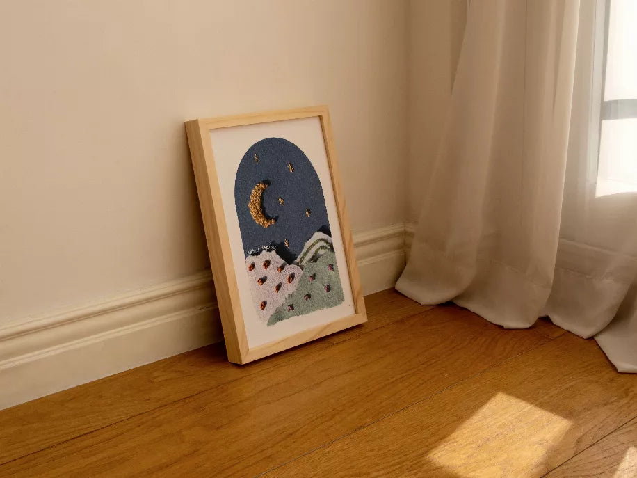 Moon-themed framed wall art (5x7) with blue night sky, crescent moon, and stars