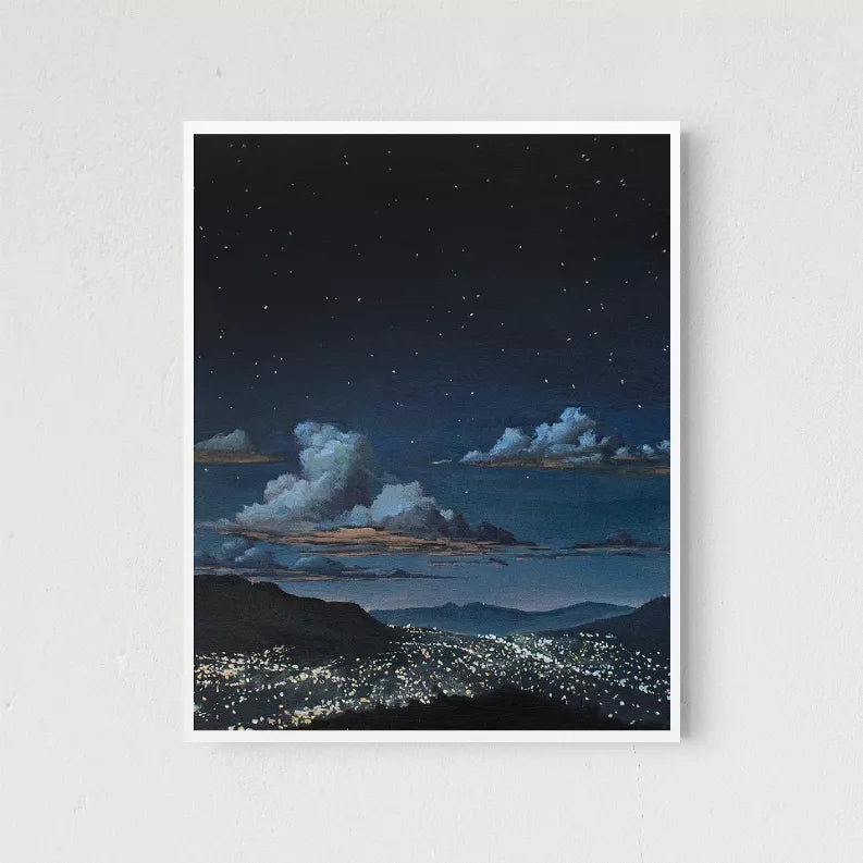 Square framed night sky photo with starry sky, clouds, mountains and city lights.