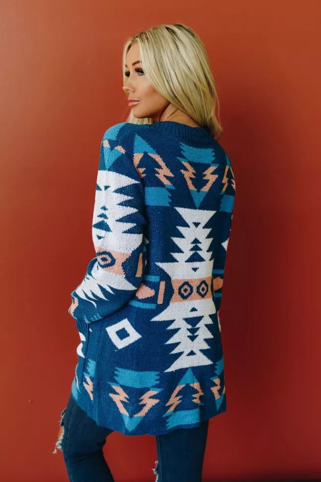 Patterned cardigan with geometric back and side design, blue white brown knit