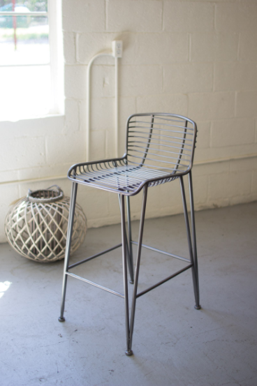 Grey metal bar stool with wire seat and backrest and four slim legs