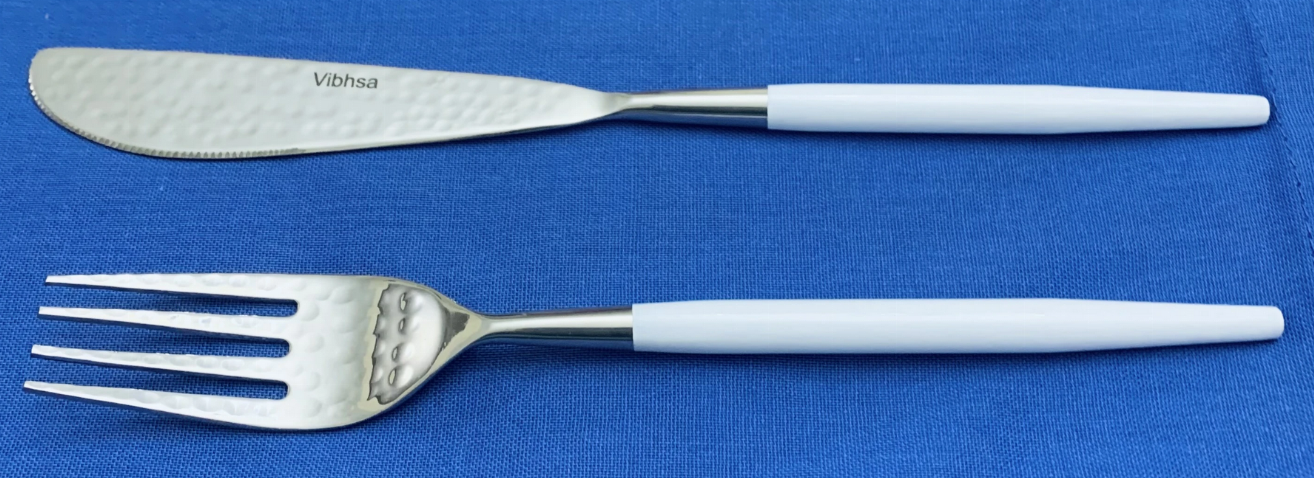 Vibhsa stainless steel dinner fork and knife with white handles