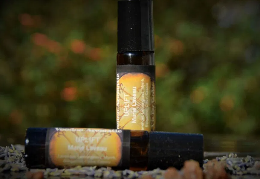 Marie Laveau Aromatic 10 ml roller bottle with brown glass and amber liquid